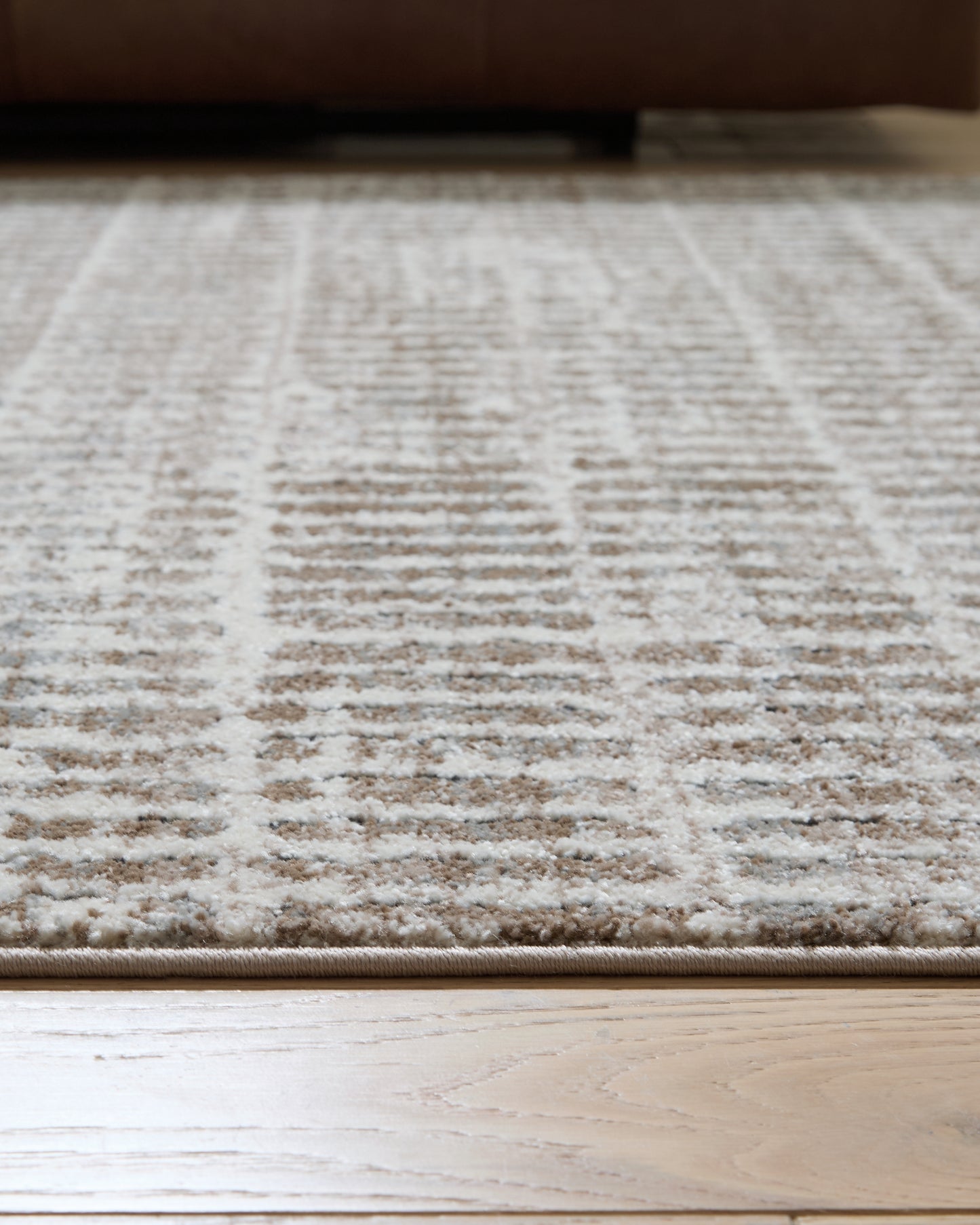 Fuadwick 5'3" x 7' Area Rug
