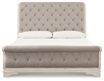 Realyn Queen Upholstered Sleigh Bed and Chest