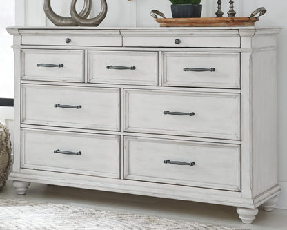 Kanwyn Queen Upholstered Panel Bed, Dresser, and Nightstand