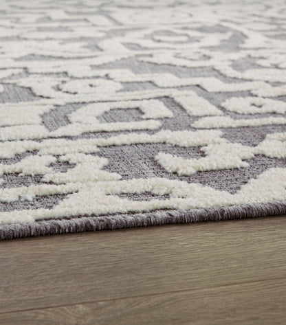 Oddetteley 5'1" x 7'2" Washable Rug