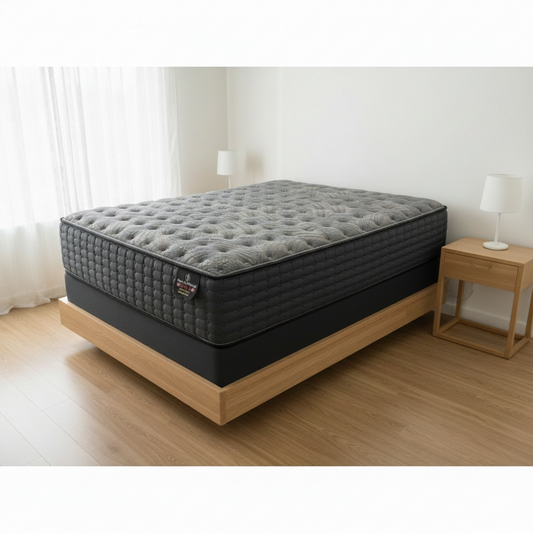 Gray mattress with a brand logo on a white background
